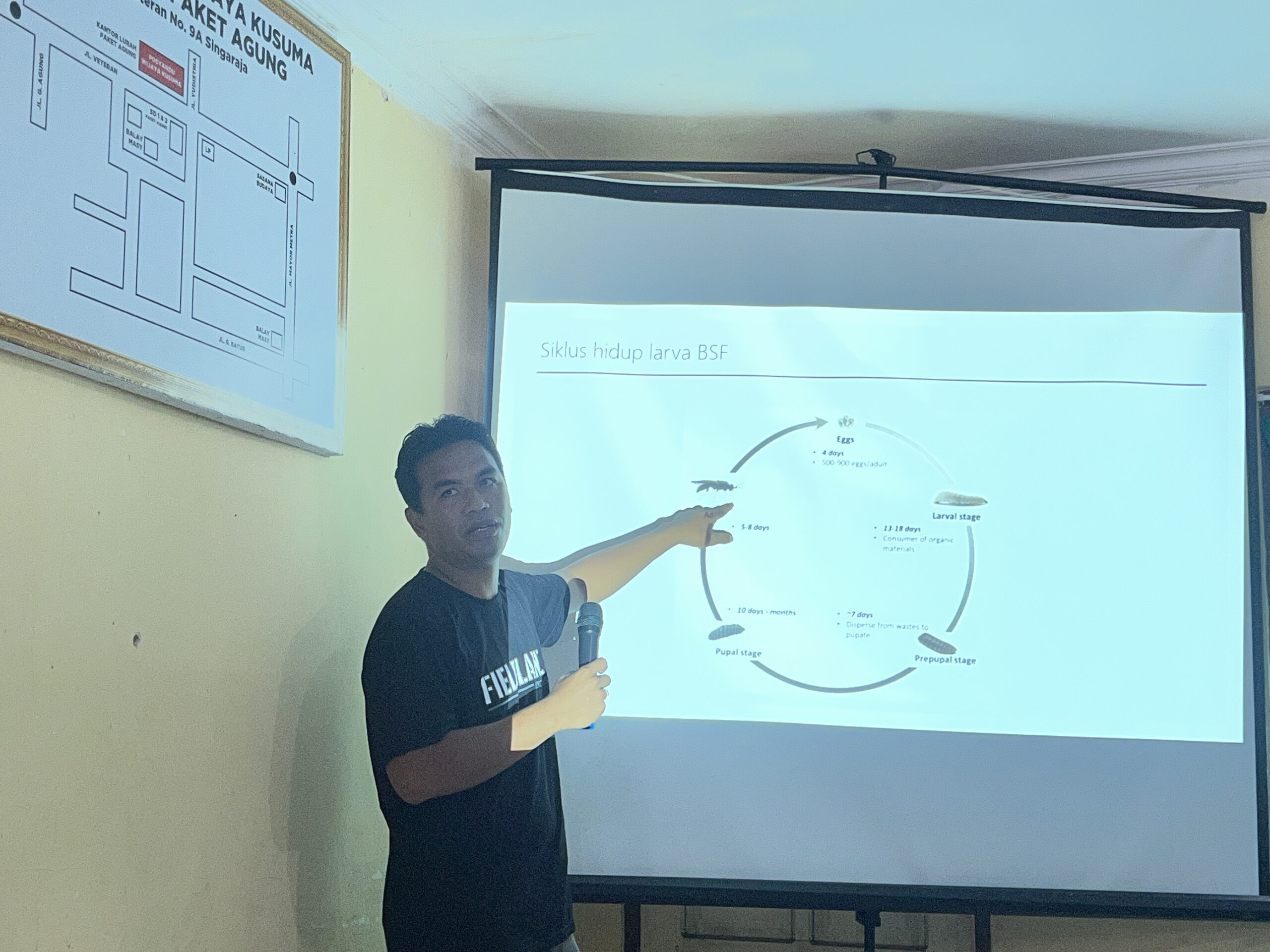 Presentation by Mr. Ketut from the Giri Segara Village-Owned Enterprise (BUMDesa) in Les Village, as the speaker for the BSF maggot cultivation workshop 