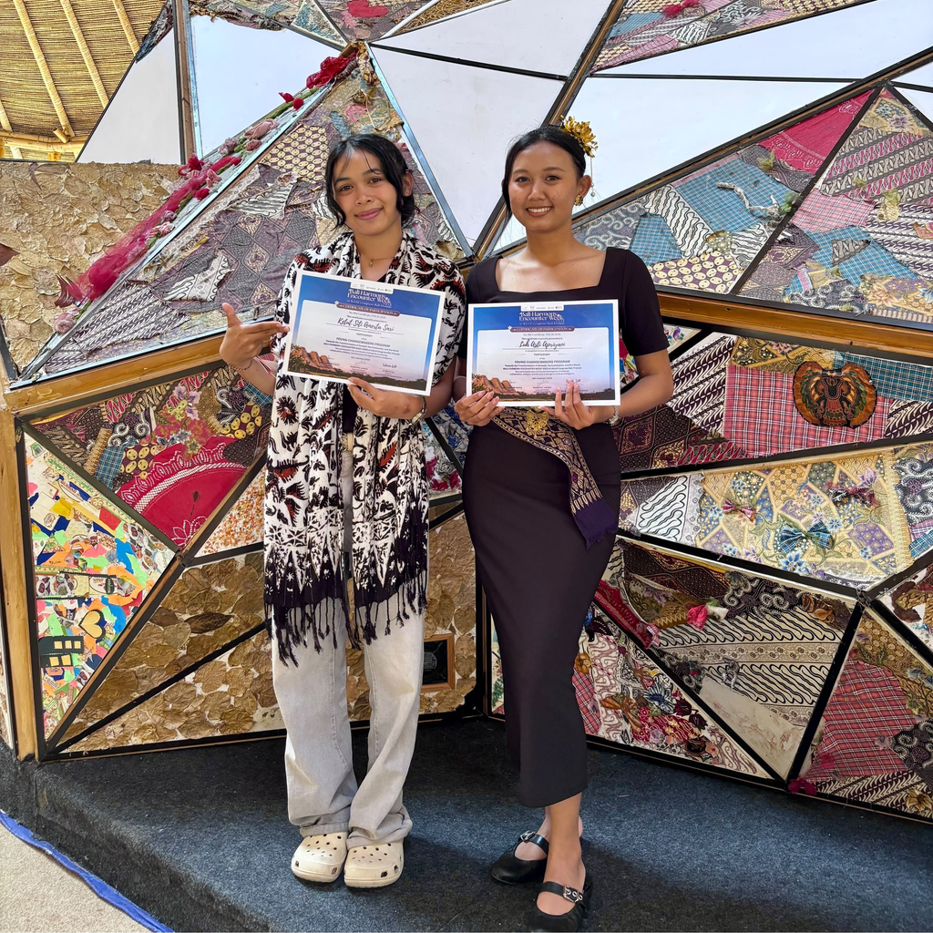 Presentation of Award certificates to Siti and Asti for Completing the Program